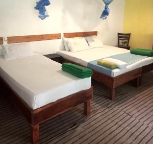Postelja oz. postelje v sobi nastanitve Ella Foret accomodation