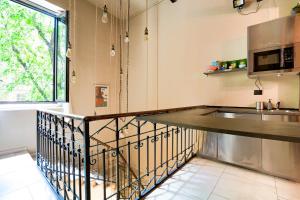Kuchyň nebo kuchyňský kout v ubytování Maison Dante - Smart stays