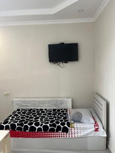 TV in/ali zabaviščno središče v nastanitvi Hotel Prince