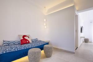Posteľ alebo postele v izbe v ubytovaní Art Hotel Santorini