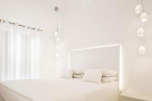 Posteľ alebo postele v izbe v ubytovaní Art Hotel Santorini
