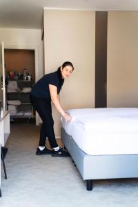 Posteľ alebo postele v izbe v ubytovaní motel22 Parkplatz inklusive