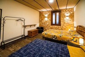 Postel nebo postele na pokoji v ubytování Casa Rural en Bodega La posada de Vitis