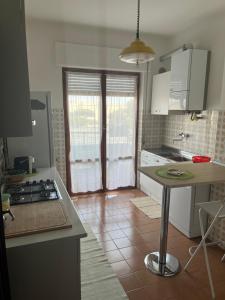 Kuchyň nebo kuchyňský kout v ubytování B&B Del Porto