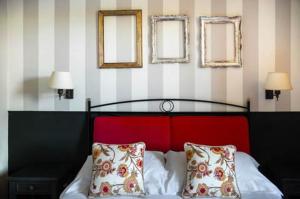 A bed or beds in a room at San Giovanni Terme Rapolano