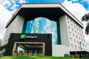 a building with the houston firm logo on it at Holiday Inn San Salvador by IHG in San Salvador