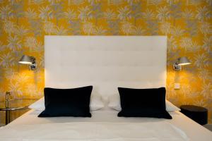 Ein Bett oder Betten in einem Zimmer der Unterkunft Hotel Ottheinrich