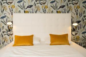 Ein Bett oder Betten in einem Zimmer der Unterkunft Hotel Ottheinrich