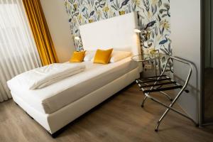 Ein Bett oder Betten in einem Zimmer der Unterkunft Hotel Ottheinrich