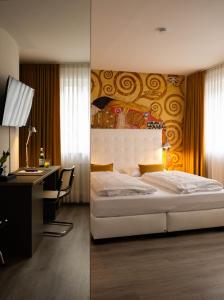 Ein Bett oder Betten in einem Zimmer der Unterkunft Hotel Ottheinrich