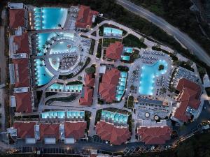 an aerial view of a resort with a pool at Cora Hotel & Spa in Afitos