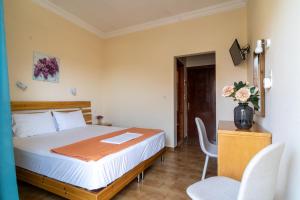 Postel nebo postele na pokoji v ubytování Hotel Hercules