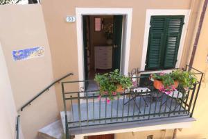 A balcony or terrace at Ricky Rooms