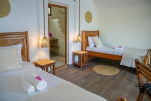 Postel nebo postele na pokoji v ubytování Juana Ocean Villas + 24 fotografií