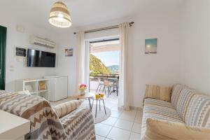 TV a/nebo společenská místnost v ubytování Villa Dante 162 in Corfu island
