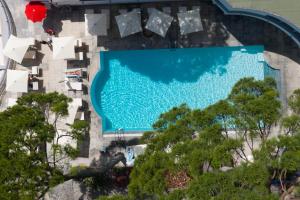 an overhead view of a swimming pool with trees at Imperiale Palace Hotel in Santa Margherita Ligure