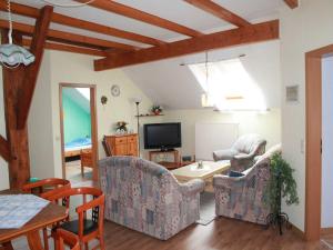 TV a/nebo společenská místnost v ubytování Ferienhof van Vlyten_ 45006