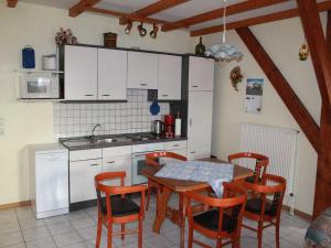 Kuchyň nebo kuchyňský kout v ubytování Ferienhof van Vlyten_ 45006