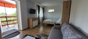 Posteľ alebo postele v izbe v ubytovaní A Bringás Apartman