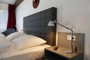 Ein Bett oder Betten in einem Zimmer der Unterkunft Hotel Ottheinrich