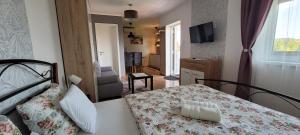 Posteľ alebo postele v izbe v ubytovaní A Bringás Apartman