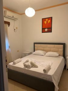 Postel nebo postele na pokoji v ubytování Hotel Arsenal