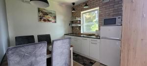Kuchyňa alebo kuchynka v ubytovaní A Bringás Apartman