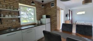 Kuchyňa alebo kuchynka v ubytovaní A Bringás Apartman