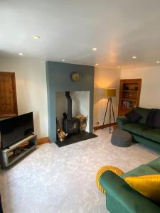 Ruang duduk di Fettlers Cottage, Cumbria