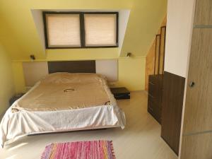 Postel nebo postele na pokoji v ubytování Coral Guest House