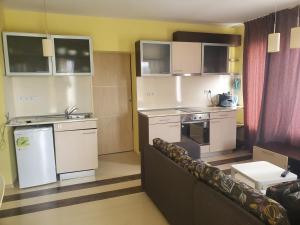 Kuchyň nebo kuchyňský kout v ubytování Coral Guest House