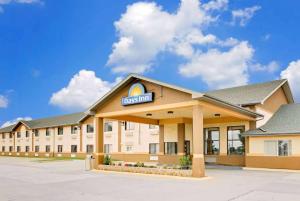 a hotel with a sign on the front of it at Days Inn by Wyndham North Sioux City in North Sioux City