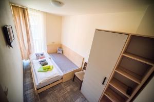 Postel nebo postele na pokoji v ubytování Wellness & Spa Hotel Čertov