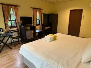 Postel nebo postele na pokoji v ubytování Chaweng Bliss Bungalow