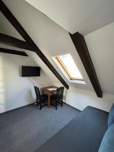 TV a/nebo společenská místnost v ubytování Zakątek Bursztynowy