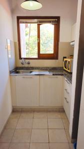 Virtuve vai virtuves zona naktsmītnē Apartamentos Don Gerardo