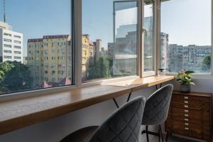 Φωτογραφία από το άλμπουμ του Cozy Urban Studio Piata Victoriei σε Floreasca