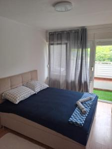 Postel nebo postele na pokoji v ubytování Apartman -stan na dan-