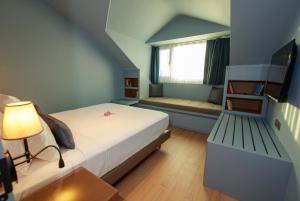 Postel nebo postele na pokoji v ubytování Casa Lumar Luxury Lodging- Adult Only