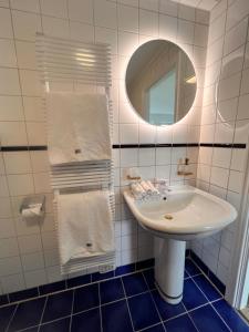 Koupelna v ubytování Casa Hönö Hästen + 23 fotografií