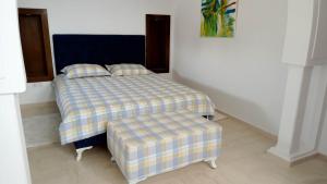 Postel nebo postele na pokoji v ubytování Chambres d'hôtes Conviviales avec piscine privée Chambre Blue Lagune & Suite Azur