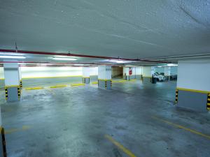 an empty parking garage with a parking lot at Farah Hotel Apartments in Jeddah +16 photos