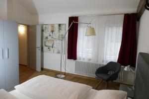 Ein Bett oder Betten in einem Zimmer der Unterkunft Hotel Ottheinrich