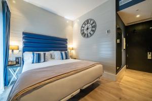 Posteľ alebo postele v izbe v ubytovaní Abba San Sebastián Hotel
