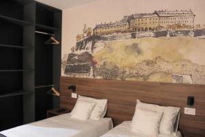 Katil atau katil-katil dalam bilik di Tvrdjava Rooms - Novi Sad