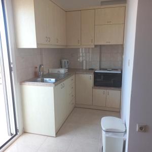Kuchyň nebo kuchyňský kout v ubytování Central Rooms