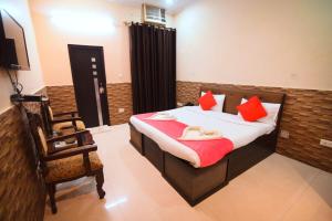 A bed or beds in a room at Taraji Resort