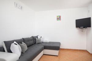 Μια τηλεόραση ή/και κέντρο ψυχαγωγίας στο Apartmani twins