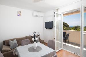 Μια τηλεόραση ή/και κέντρο ψυχαγωγίας στο Apartmani twins