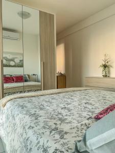 A bed or beds in a room at Casa Silvia - Accogliente appartamento a 5 minuti dalla stazione di Pescara Portanuova